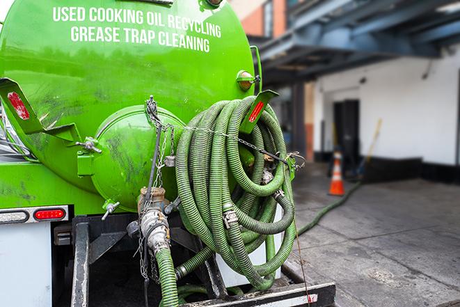 routine pumping of grease trap at a cafeteria in Allison